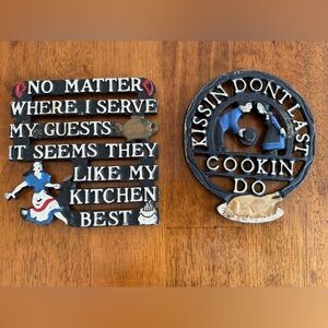 Two Vintage Cast Iron Trivets with kitchy sayings